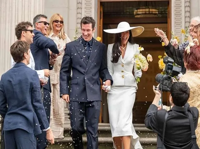 Dua Lipa and Callum Turner celebrate their wedding at Old Marylebone Town Hall in London.