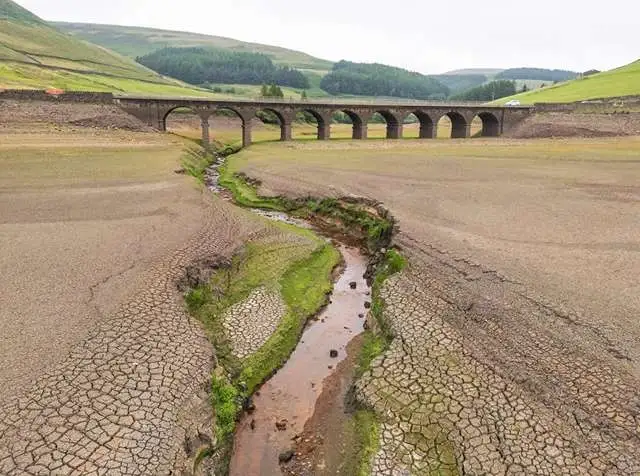 Climate report warns the United Kingdom is unprepared for worsening heatwaves and flooding.