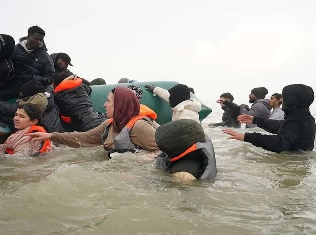 Small boats carrying migrants cross the English Channel as the UK agrees a £660m deal with France to increase enforcement and reduce crossings.